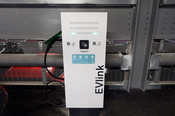 Close-up_of_Schneider_Electric_EVlink_car_charging_unit_installed_by_Mere_UK